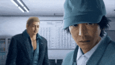 a man wearing a blue hat stands next to another man in a suit