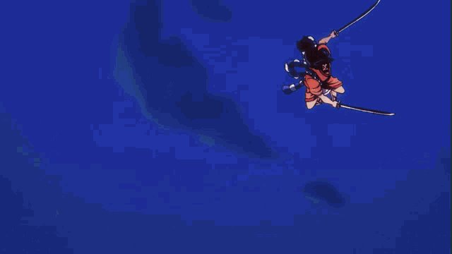 a person is holding a sword with a blue background