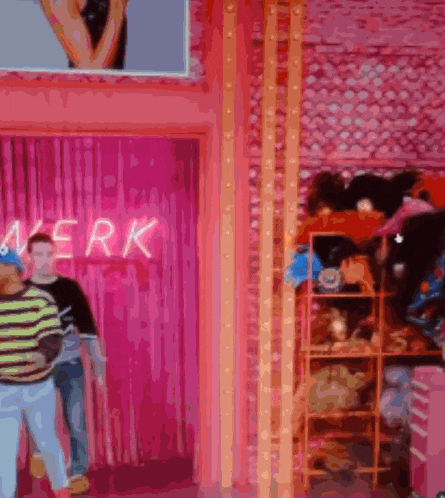 a pink room with a neon sign that reads werk