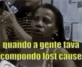 a woman is talking on a cell phone with a caption that says `` quando a gente tava compondo lost cause '' .
