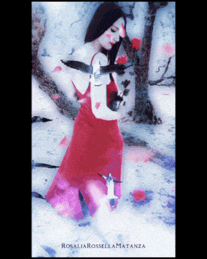 a woman in a red dress is kneeling in the snow with birds flying around her