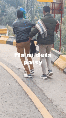 two men walking down a road with the words mani deta paisy on the bottom right