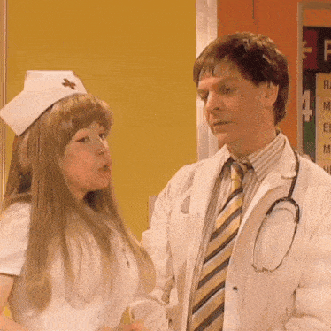 a man in a lab coat and a woman in a nurse 's hat are talking to each other