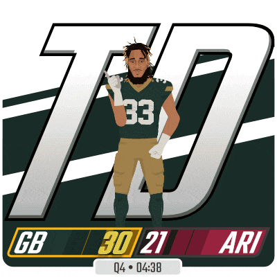 a football player with the number 33 on his jersey is giving a thumbs up