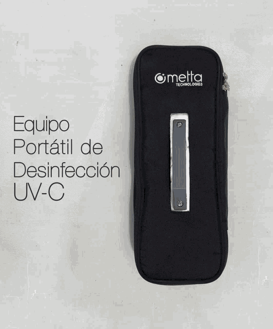 a metta technologies device sits next to a charger