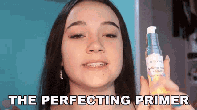 a woman is holding a bottle of primer with the caption " the perfecting primer "