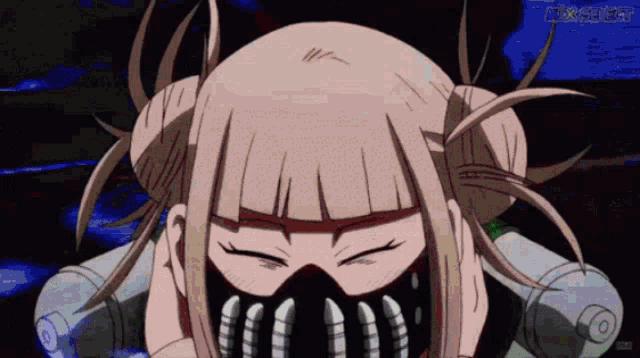 a girl with blonde hair and a mask on her face looks at the camera with her eyes closed