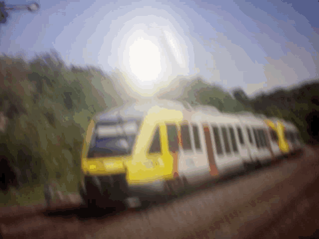 a blurred image of a train that says ' a ' on the front