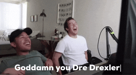 two men are laughing in front of a microphone and the words goddamn you dre drexler