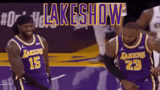 two basketball players wearing lakers jerseys are standing on a court