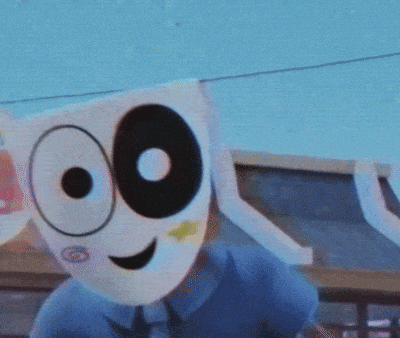 a cartoon character with a cup on his head and circles around his eyes