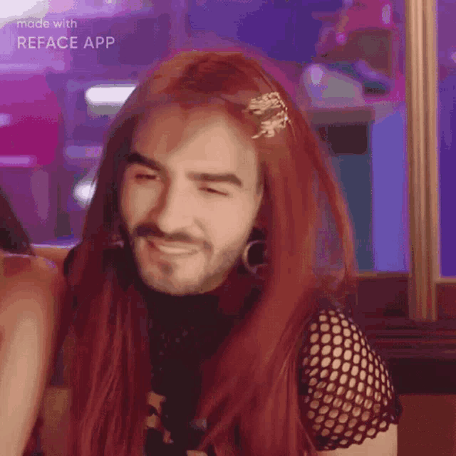 a man with a beard is wearing a red wig and earrings
