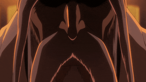 a close up of a person 's face with a beard