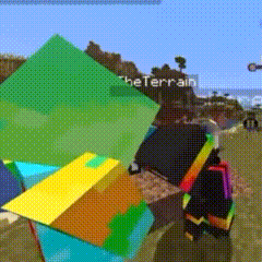 a person is playing a video game with a rainbow colored cube in the foreground .