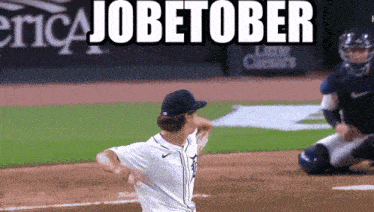a baseball player throws a ball with the word jobetober written on the bottom