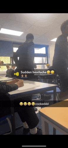 a group of people in a classroom with a caption that says sudden headache cookedd