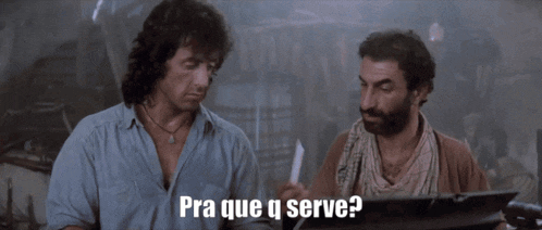 a man with a beard is holding a light stick with the words e o que q ela faz written below him