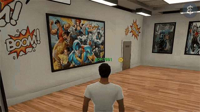 a man standing in front of a painting that says boom on the wall