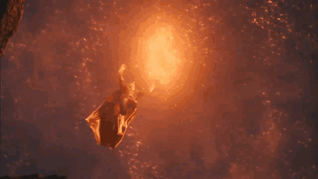 a plane is flying through the air with a lot of flames