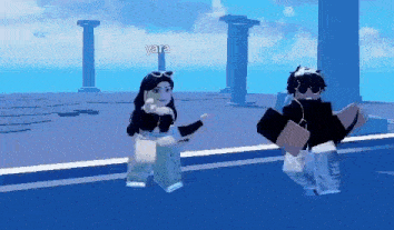 a boy and a girl are dancing together in a video game .