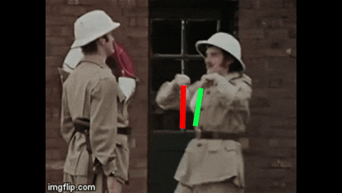 two soldiers are standing in front of a door with a red and green line between them