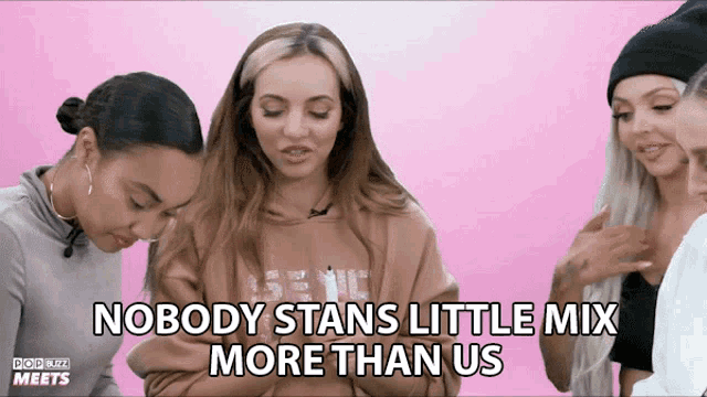 a group of women standing next to each other with the words " nobody stans little mix more than us " on the bottom