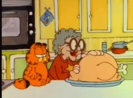 Garfield Thanksgiving GIF - Garfield Thanksgiving Carving Turkey GIFs