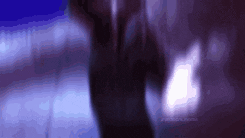 a person 's hand is visible in a blurry photo with a purple background and the words psychic moons