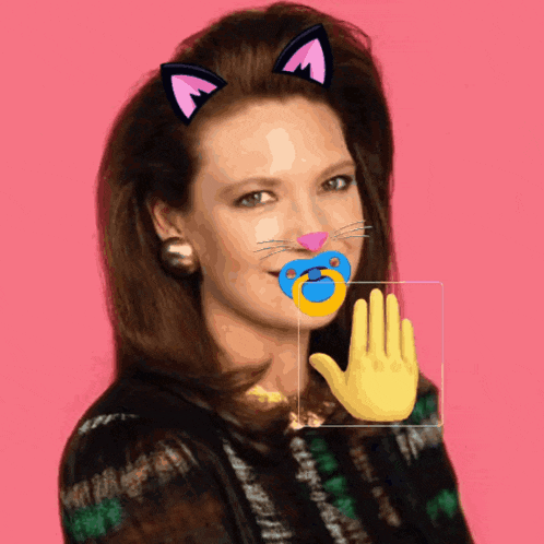 a woman with a pacifier in her mouth and cat ears