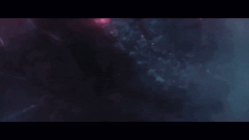 a close up of a purple light coming out of a hole in a wall .