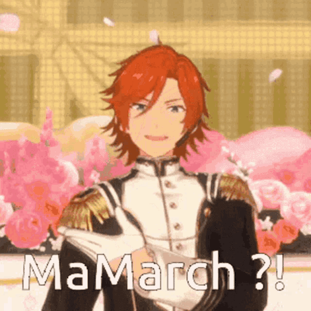 a man with red hair is standing in front of flowers and says mamarch