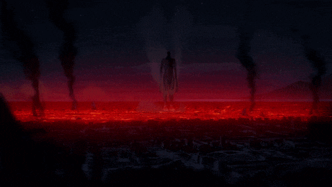 a silhouette of a man standing in a field of fire