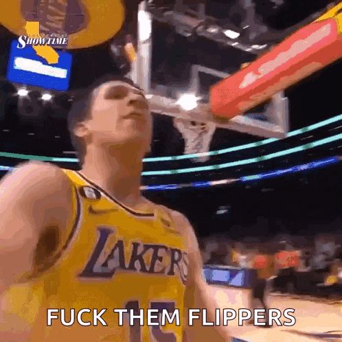 a man in a lakers jersey says fuck them flippers during a basketball game