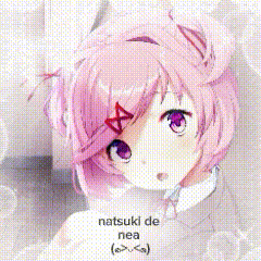 a girl with pink hair is giving a peace sign in a school classroom .