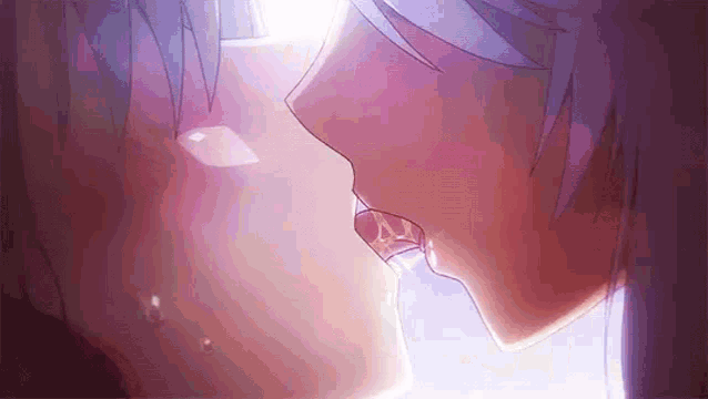 a couple of anime characters are kissing each other with their mouths open .