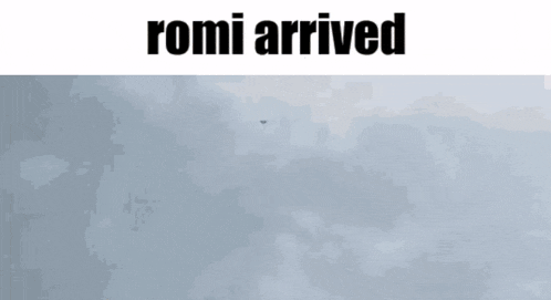 a statue of a man is flying through the air with the words `` romi arrived '' written above it .
