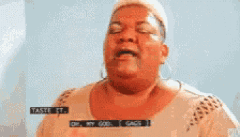 a woman is making a funny face and says taste it
