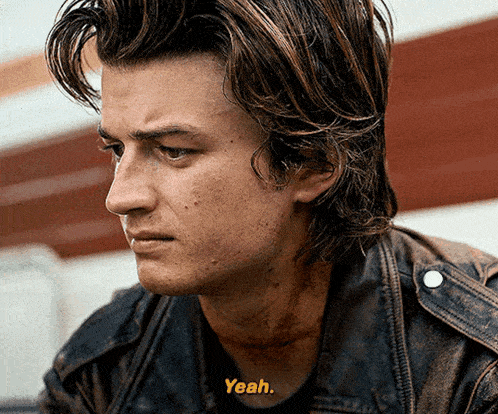a close up of a man 's face with the words " yeah " above him