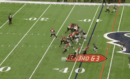 a football game is being played on a field with a 3rd and 3 sign
