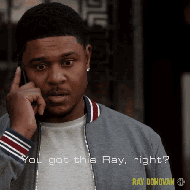 a man talking on a cell phone with the words you got this ray right
