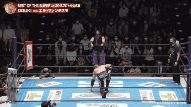 a man in a purple mask is in a wrestling ring with the words best of the super jr. on the bottom