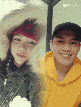 a man wearing a yellow hoodie and a woman wearing a red hat are posing for a photo with the caption capcut