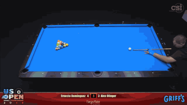 a pool table with griff 's written on the bottom right