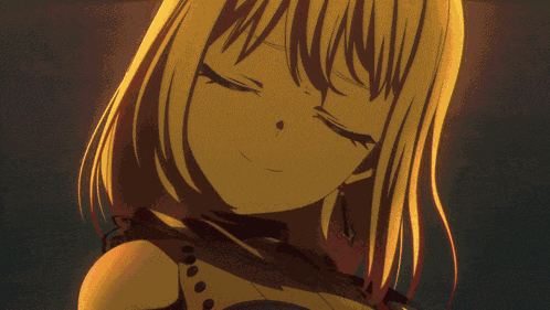 a close up of a girl with purple eyes and blonde hair