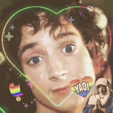 a rainbow heart with yaoi written on it is in front of a young boy 's face
