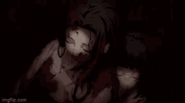 a person is laying on a bed with blood on their face and body .