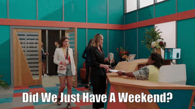 a woman standing in front of a reception desk with the words did we just have a weekend