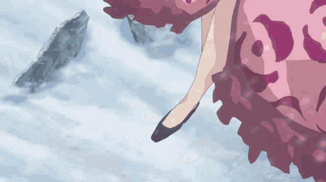 a woman 's legs are shown with a pink and purple pattern on them