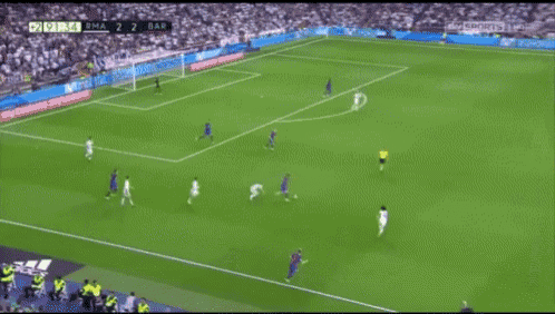 a soccer game is being played and the score is 2 to 1