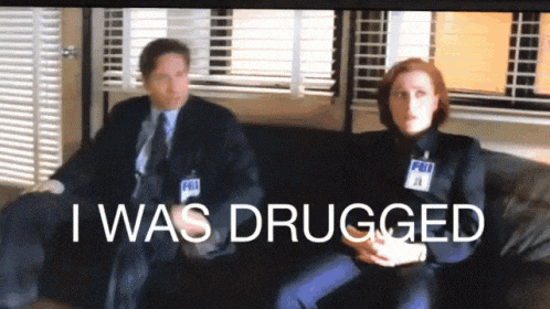a man and a woman are sitting on a couch with the words i was drugged written on the screen